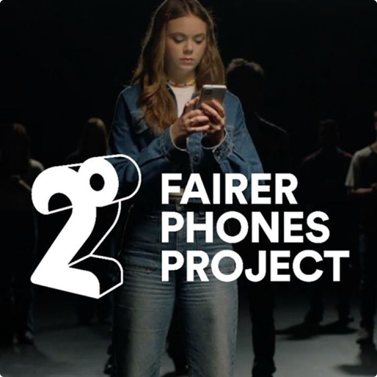 Girl standing in a dark room with people around her covered in darkness. The 2degrees logo with the heading "Fairer Phones Project" is centred 