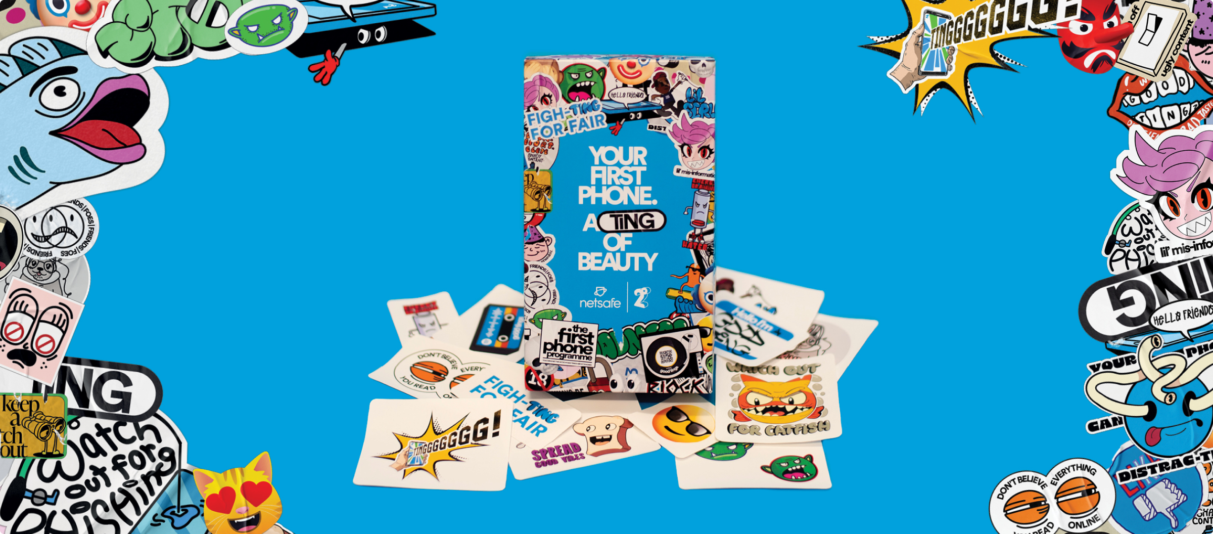 Image of the First Phone Box and the stickers that the box contains